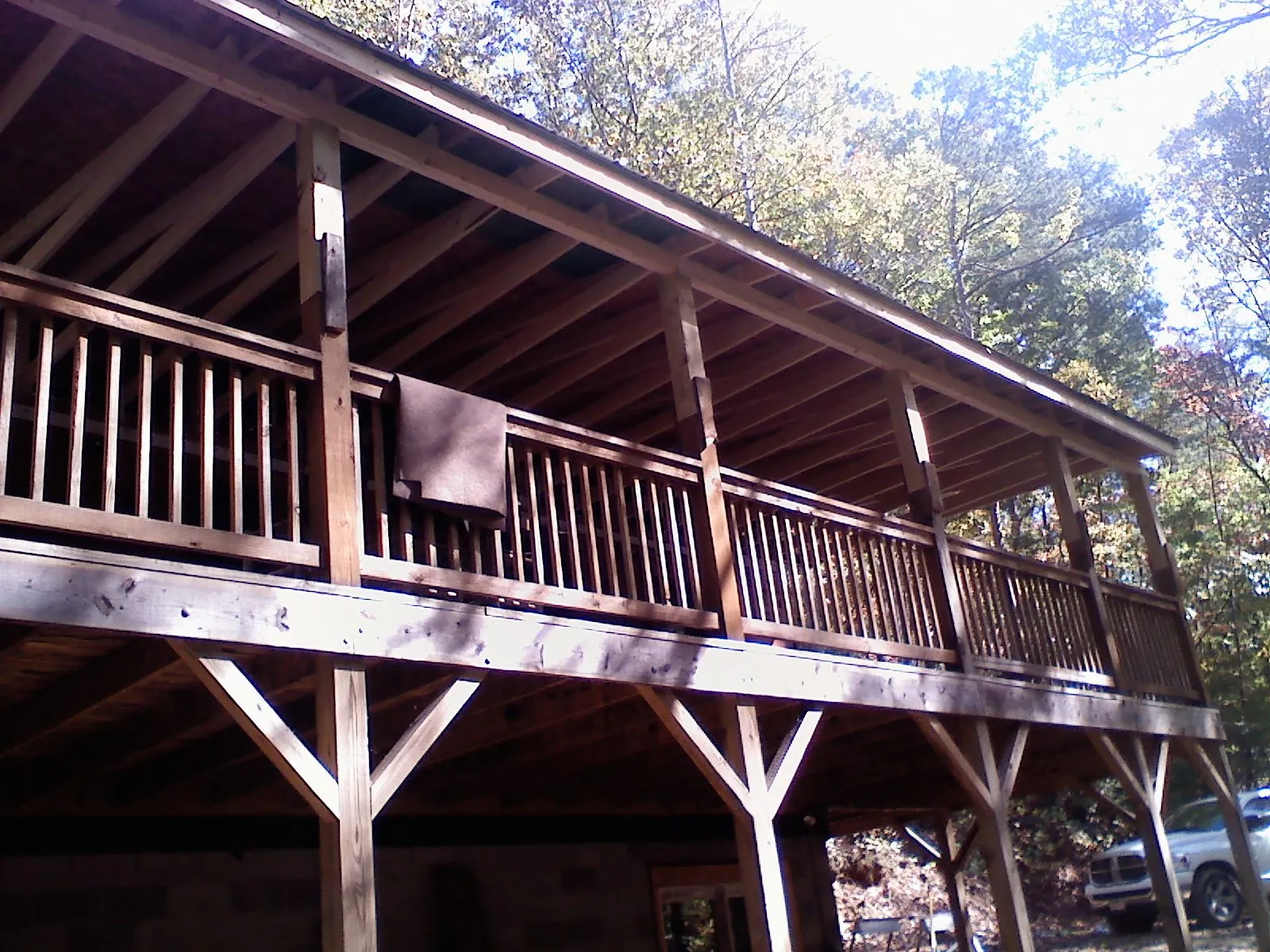 Timber framing under a new elevated porch and deck — Roof Leak Repair in Lucile by Roofing Brothers